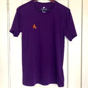 Nike ACG T-shirt. Purple with orange graphics.